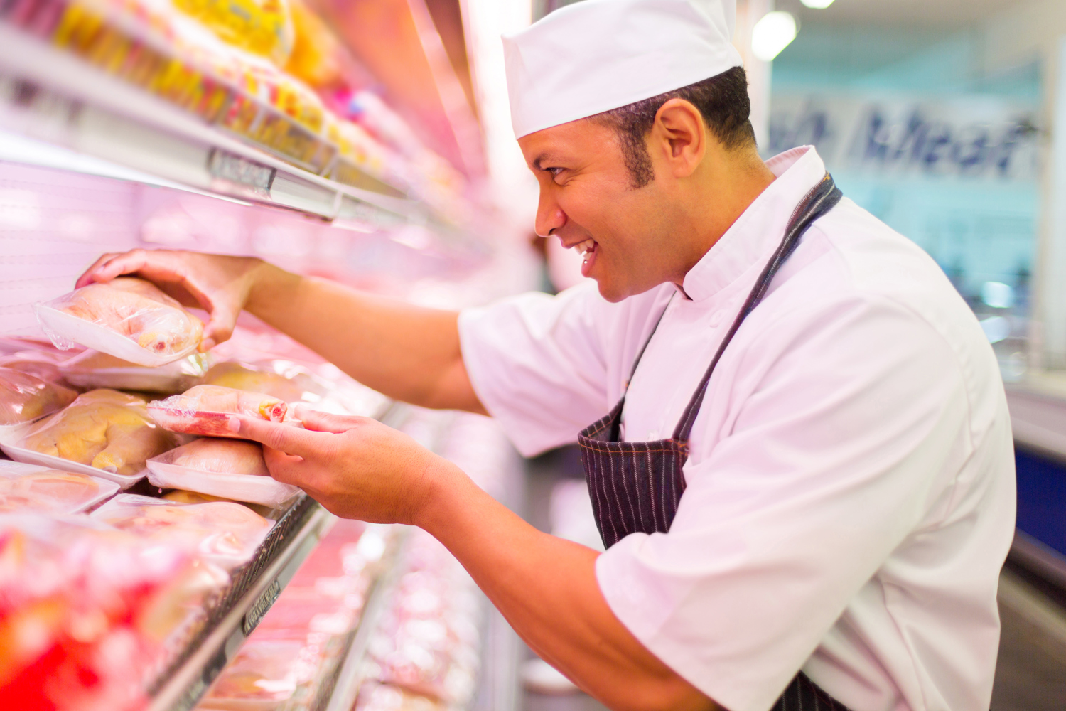 Butcher at a retail meat deparment